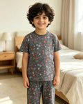 Boys’ Black Pajama Set with Fun Prints – Ages 4–14